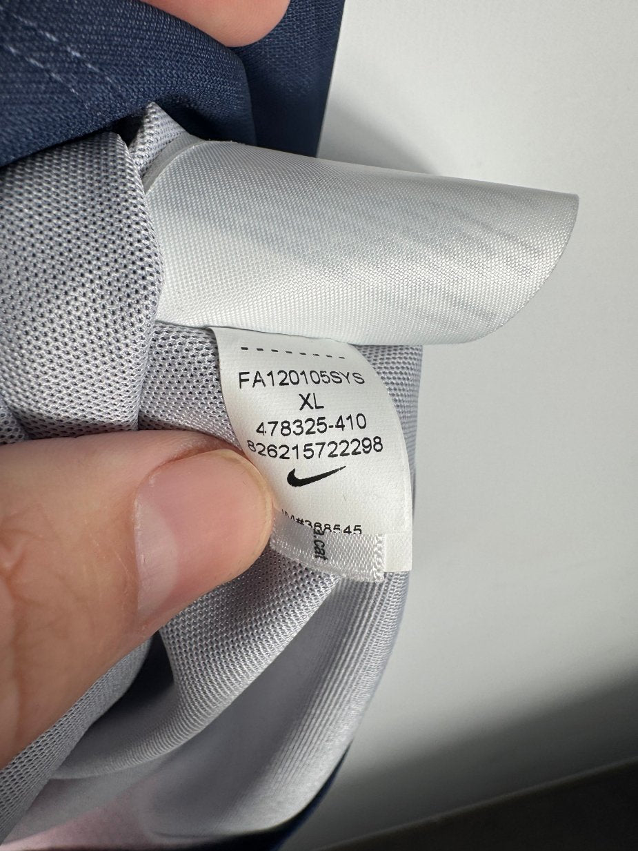 Étiquette d'authenticité avec code Nike 478325-410 prouvant l'originalité du maillot