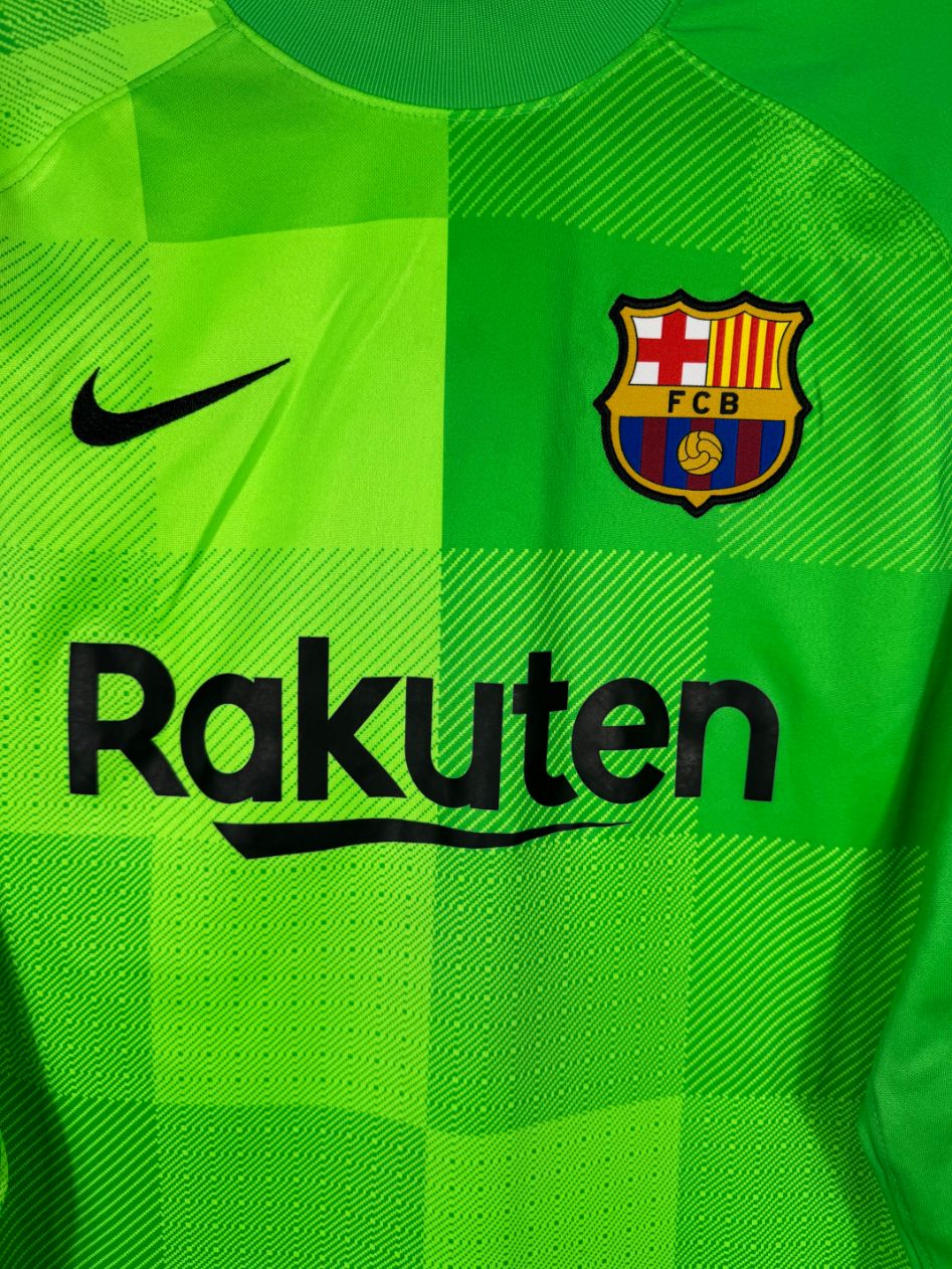 Détail de l'écusson du Barça et du logo Nike