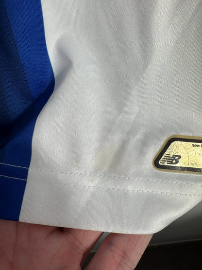 Défaut : légères taches au-dessus de l'ourlet avant et hologramme New Balance, maillot FC Porto 2016-2017