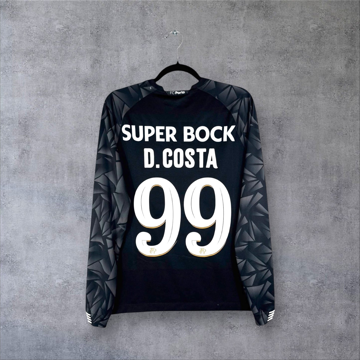 Dos du maillot de gardien FC Porto 2021 noir à manches longues avec flocage blanc D.COSTA 99 et sponsor Super Bock.