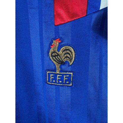 Détail de l'écusson du coq de la France