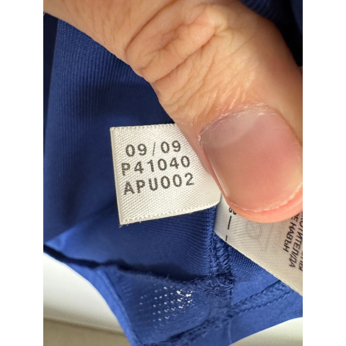 Étiquette d'authenticité avec code Adidas P41040 prouvant l'originalité du maillot