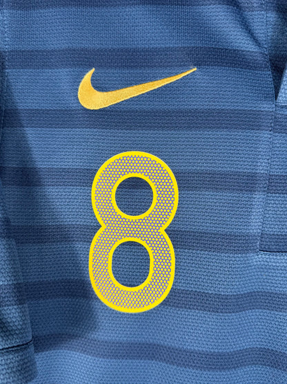 Détail de l'écusson de l'Équipe de France et du logo Nike