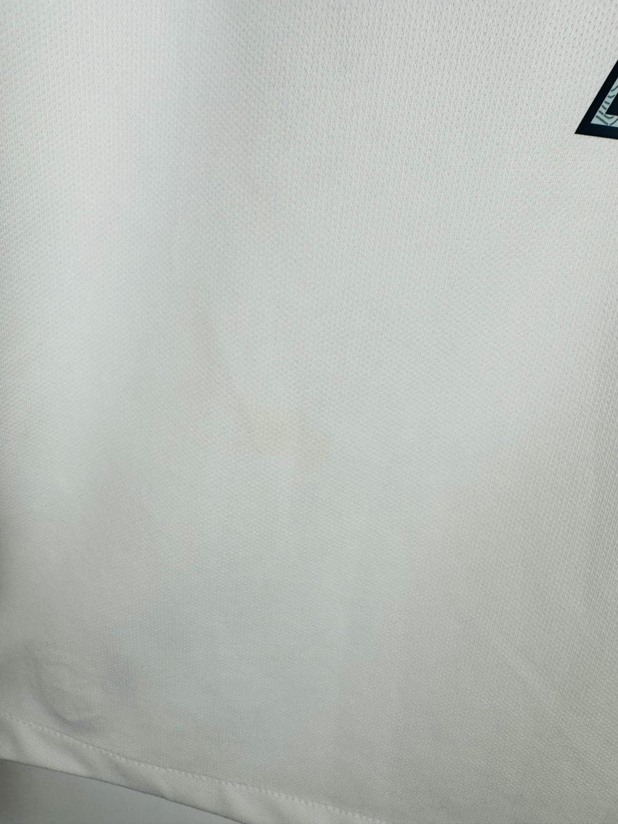 Micro-tache claire au bas du dos, maillot France extérieur 2016 Griezmann