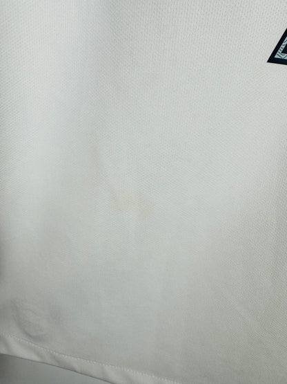 Micro-tache claire au bas du dos, maillot France extérieur 2016 Griezmann