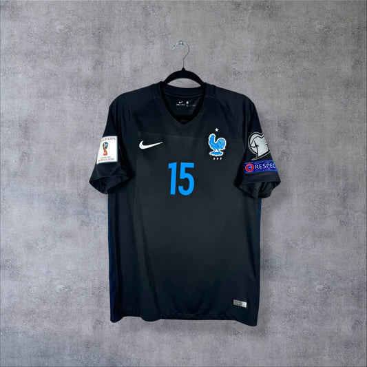 Maillot Équipe de France third 2017-2018 noir de face, coq bleu ciel et numéro 15 sur le torse