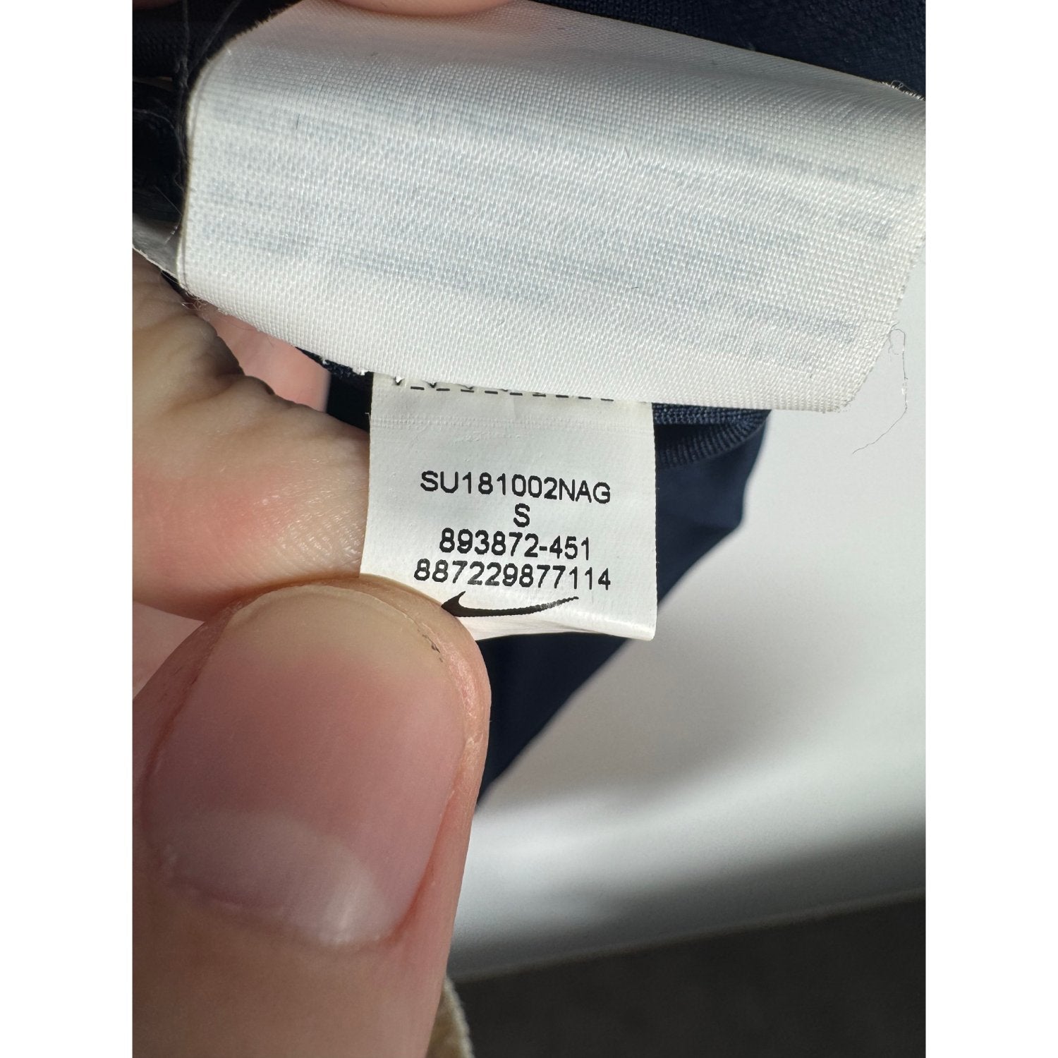Étiquette d'authenticité avec code Nike 893872-451 prouvant l'originalité du maillot