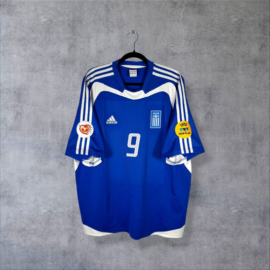 Face avant du maillot Grèce 2004 domicile bleu adidas avec numéro 9 et écusson hellénique