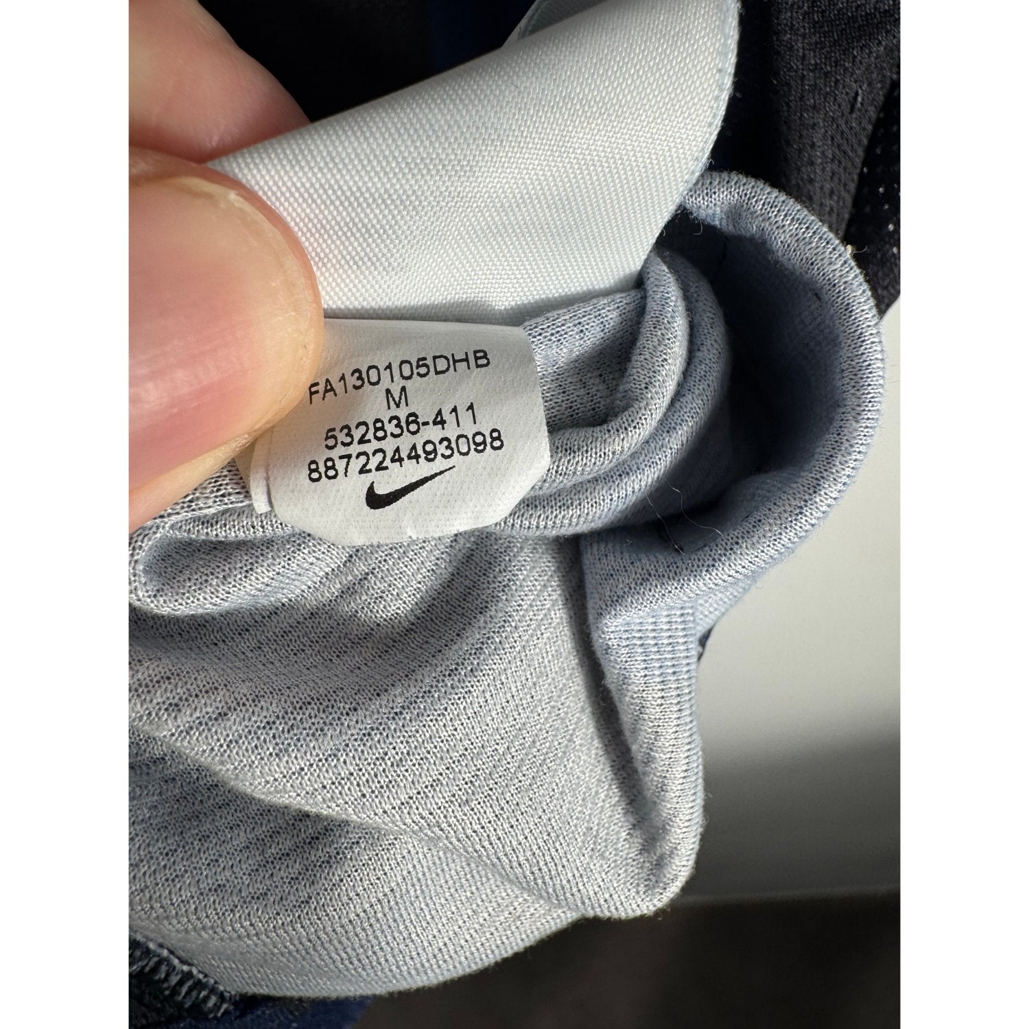 Étiquette d'authenticité avec code Nike 532836-411 prouvant l'originalité du maillot