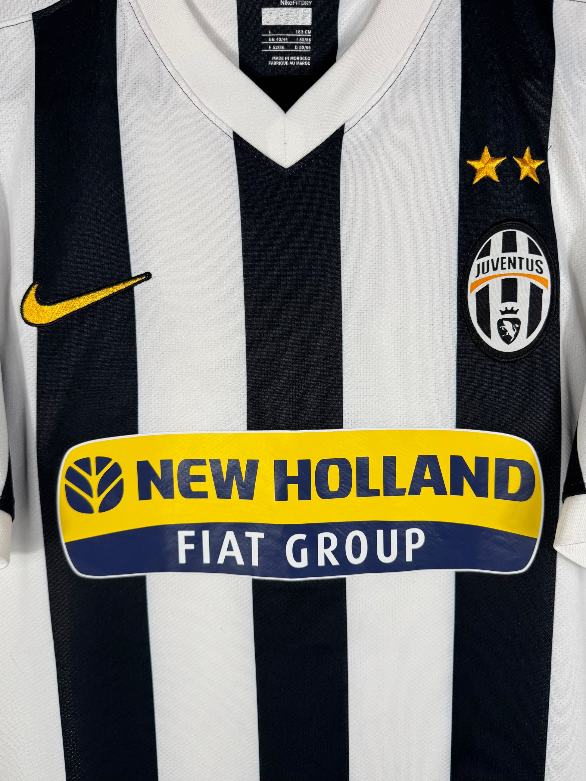 Détail de l'écusson de la Juventus et du logo Nike