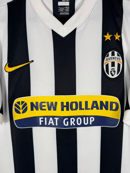 Détail de l'écusson de la Juventus et du logo Nike
