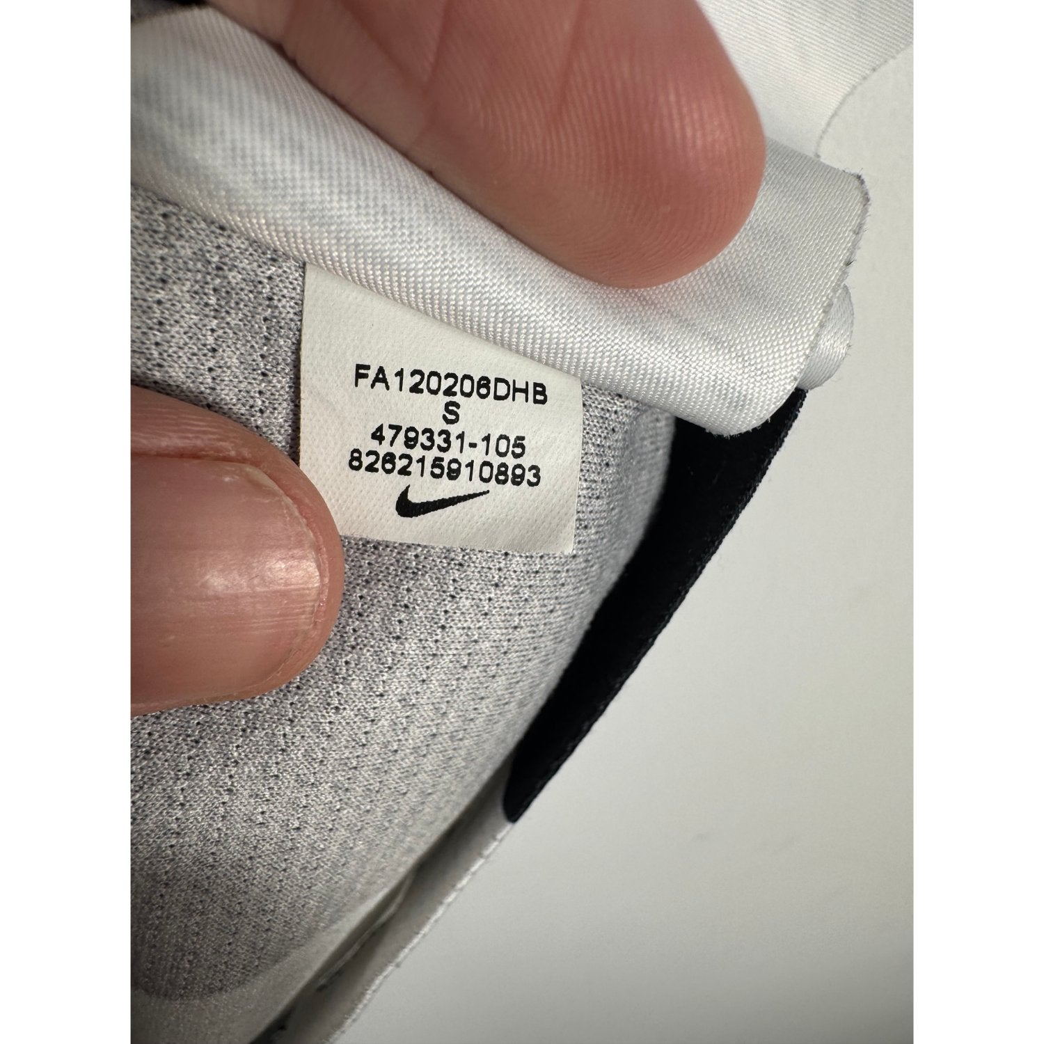 Étiquette d'authenticité avec code Nike 479331-105 prouvant l'originalité du maillot