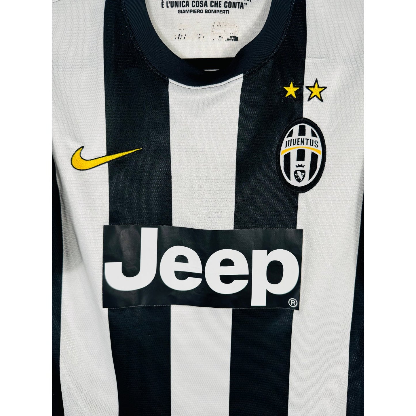 Détail de l'écusson de la Juventus et du logo Nike