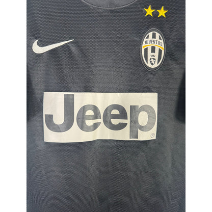 Détail de l'écusson de la Juventus et du logo Nike