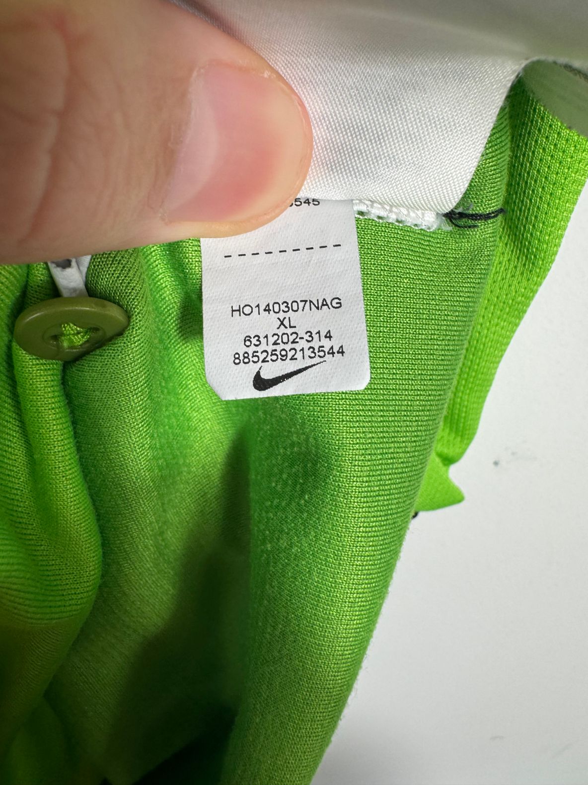 Étiquette d'authenticité avec code Nike 631202-314 prouvant l'originalité du maillot