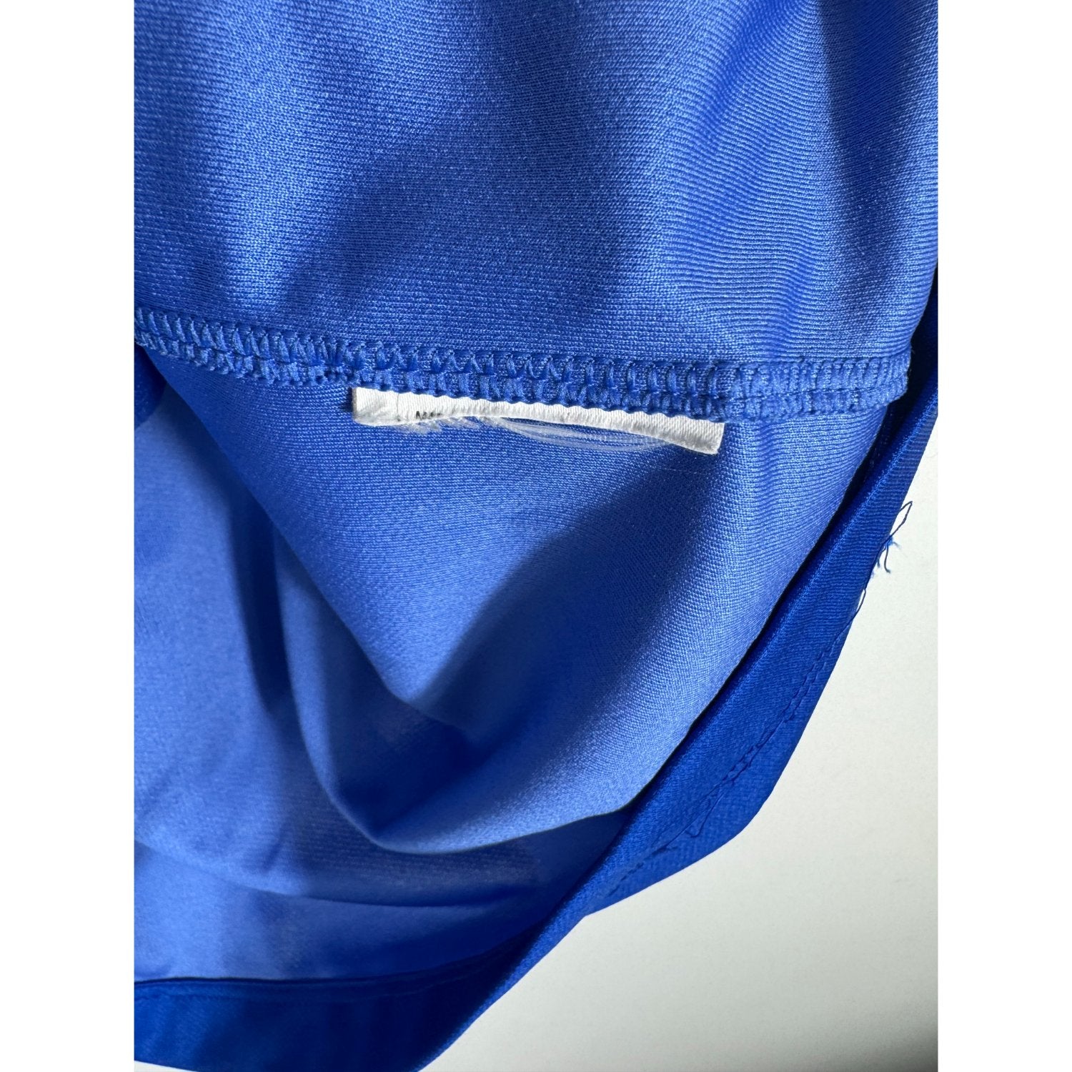 Etiquette coupée d'authenticité Nike prouvant l'originalité du maillot Juventus