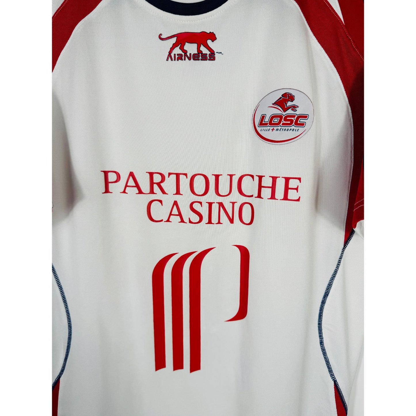Détail de l'écusson du LOSC et de la panthère Airness