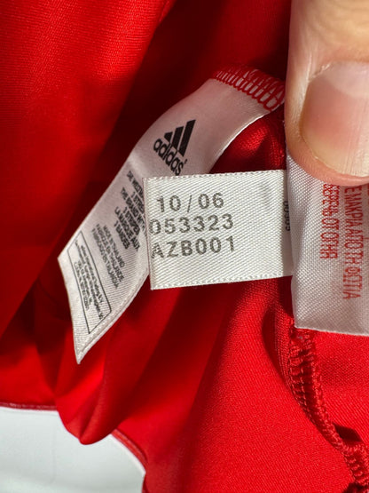 Étiquette d'authenticité avec code Adidas 053323 prouvant l'originalité du maillot