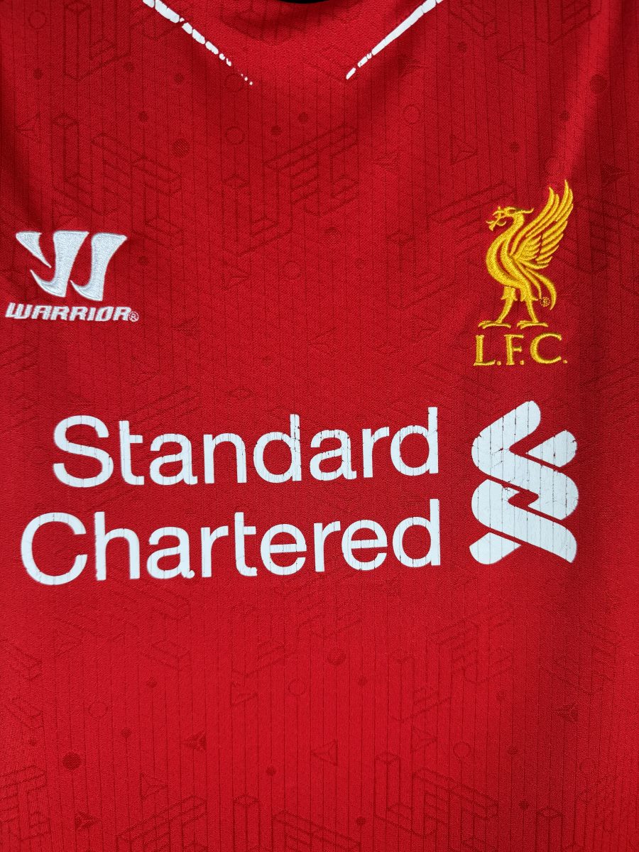 Liver Bird brode jaune et sponsor Standard Chartered sur tissu jacquard
