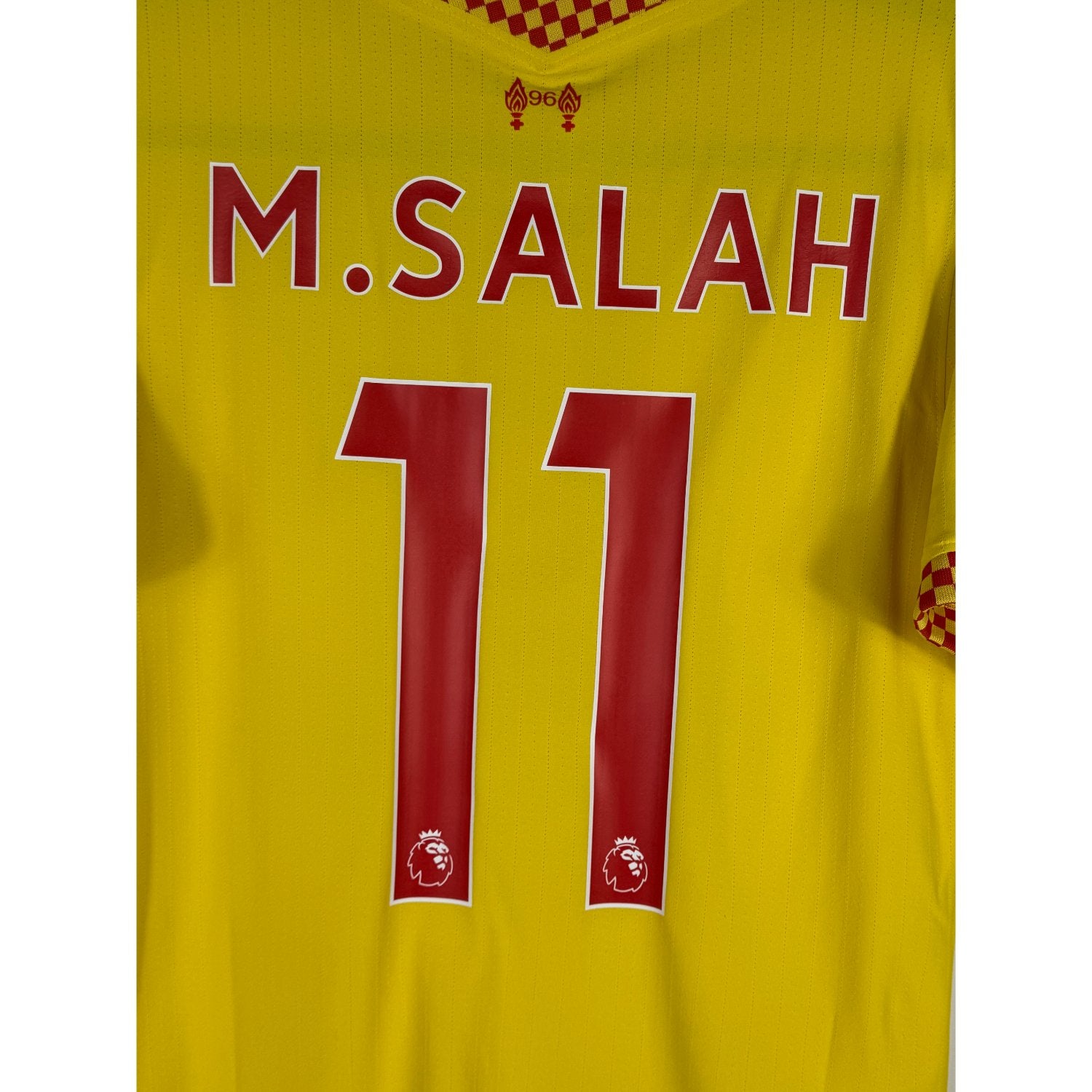 Détail de la typographie du flocage sur le numéro 11 de Mohamed Salah