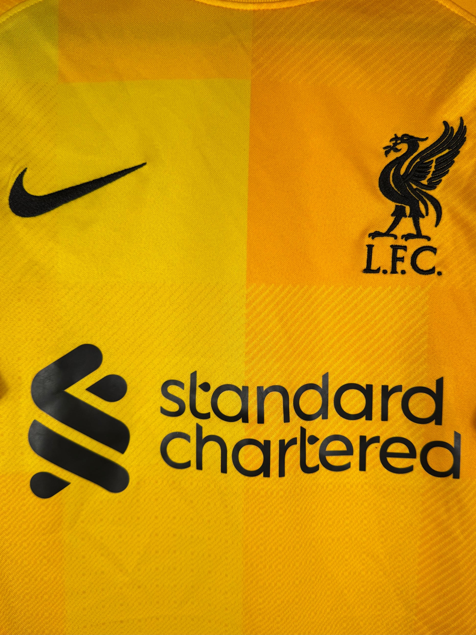 Détail de l'écusson de Liverpool et du logo Nike