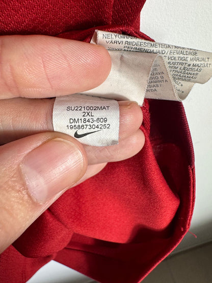 Étiquette d'authenticité avec code Nike DM1843-609 prouvant l'originalité du maillot