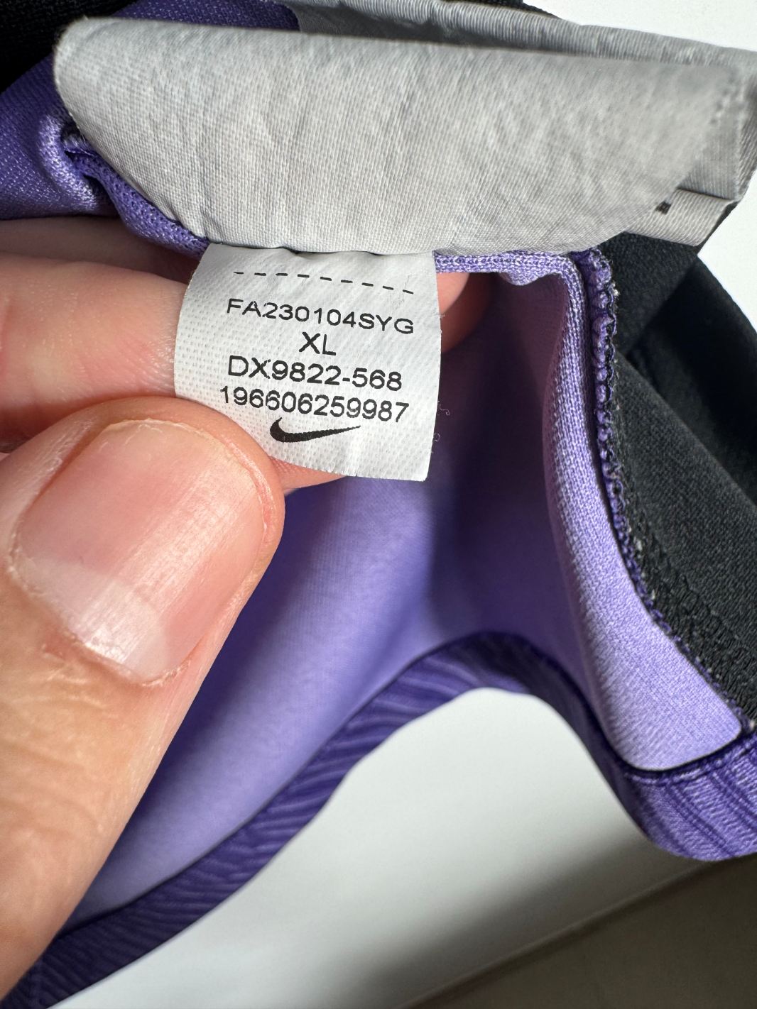 Étiquette d'authenticité avec code Nike DX9822-568 prouvant l'originalité du maillot