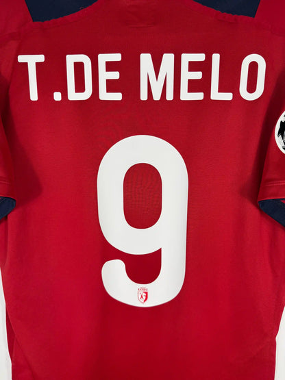 Détail flocage T.De Melo N°9 et patch UEFA Champions League starball sur maillot LOSC Lille domicile 2012-2013 héros du but Copenhague