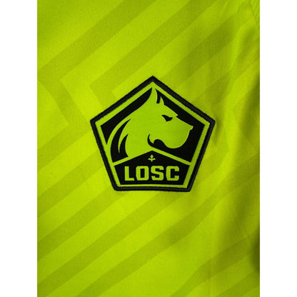 Détail de l'écusson du LOSC et du logo New Balance