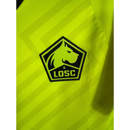 Détail de l'écusson du LOSC et du logo New Balance