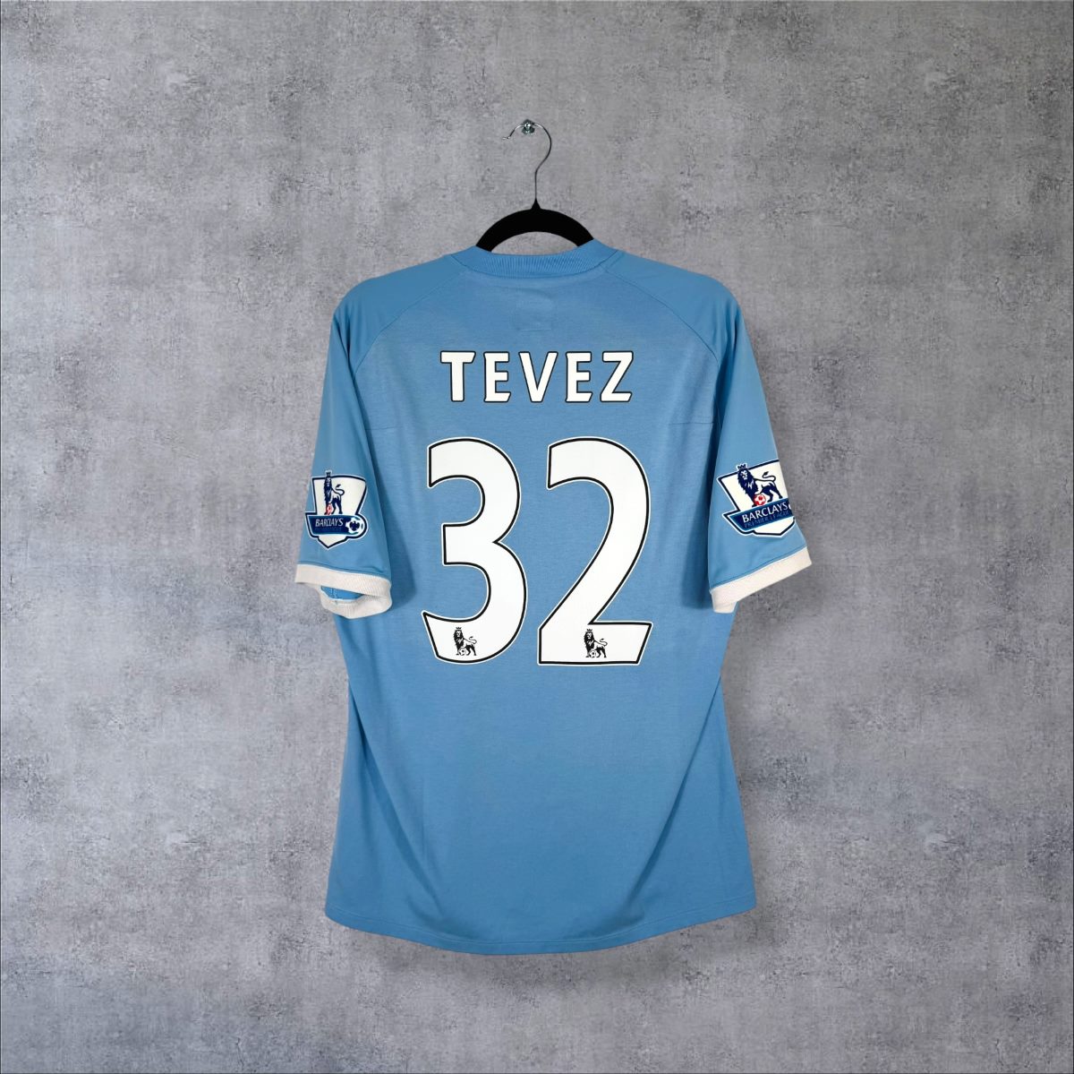 Maillot Manchester City 2010-2011 domicile Umbro bleu ciel, dos floqué Tevez 32 et badges Premier League