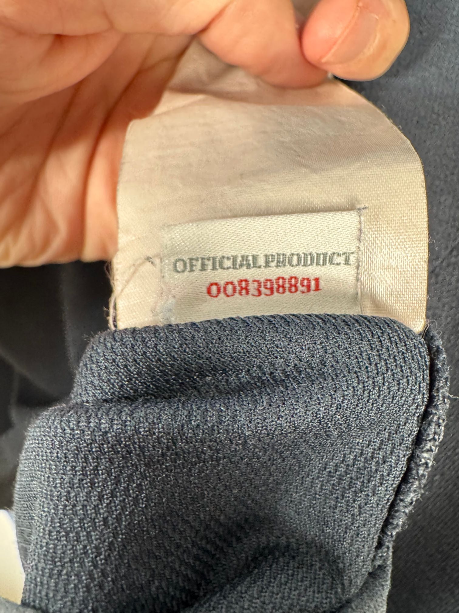 Étiquette d'authenticité Umbro prouvant l'originalité du maillot
