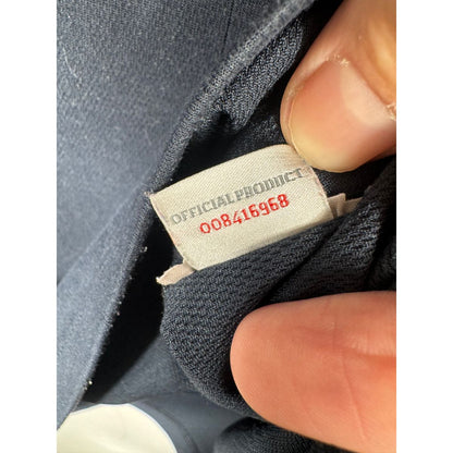 Étiquette d'authenticité Umbro prouvant l'originalité du maillot