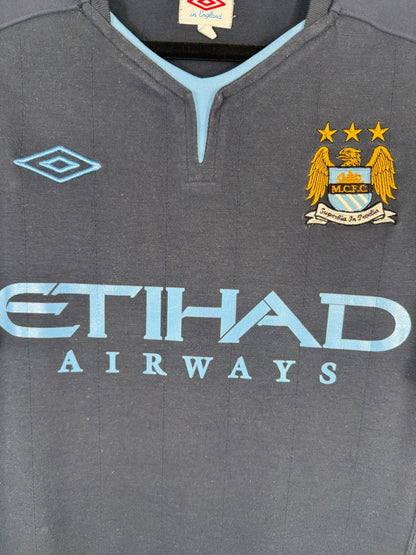 Écusson brodé à l'aigle MCFC, logo Umbro et sponsor Etihad, maillot Manchester City extérieur 2010-2011