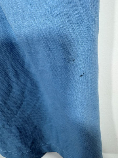 Deux petites taches sombres en bas du maillot Manchester City domicile 2012-2013