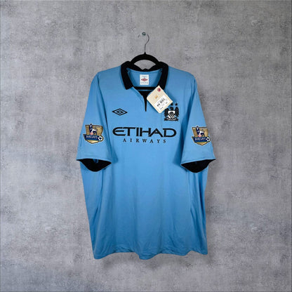 Maillot Manchester City 2012-2013 domicile bleu ciel de face, Umbro, Etihad Airways, tag magasin attaché