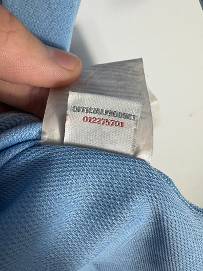 Étiquette intérieure Umbro d'authenticité prouvant l'originalité du maillot Manchester City 2012-2013