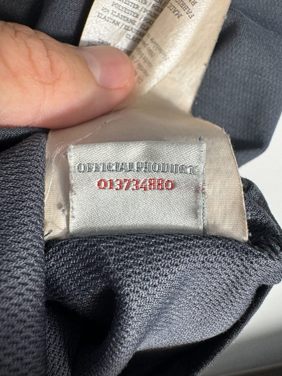 Étiquette intérieure Umbro Official Product numéro 013734880, maillot Manchester City third 2012-2013