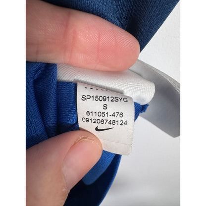 Étiquette d'authenticité avec code Nike 611051-476 prouvant l'originalité du maillot
