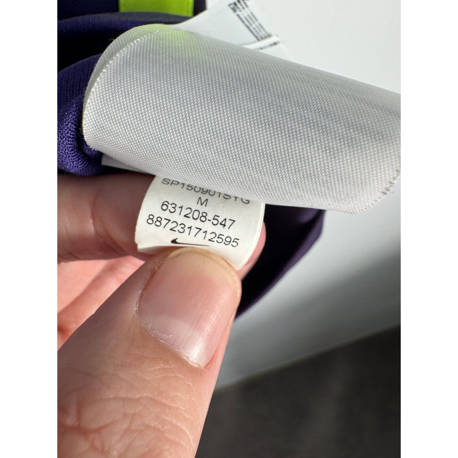 Étiquette d'authenticité avec code Nike 631208-547 prouvant l'originalité du maillot