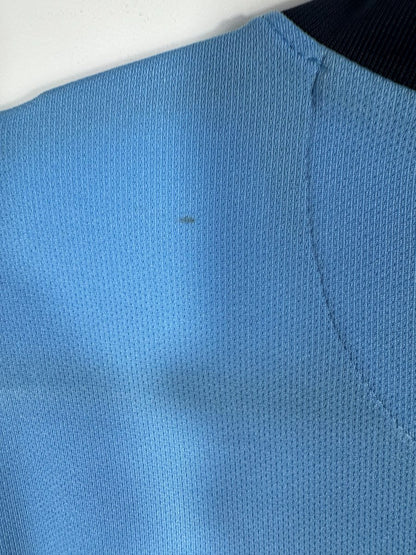 Défaut : micro trace sur le tissu, maillot Manchester City domicile 2014-2015