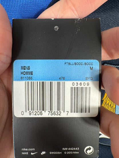 Détail des étiquettes neuves d'origine (BNWT) sur le maillot de Manchester City Manches Longues