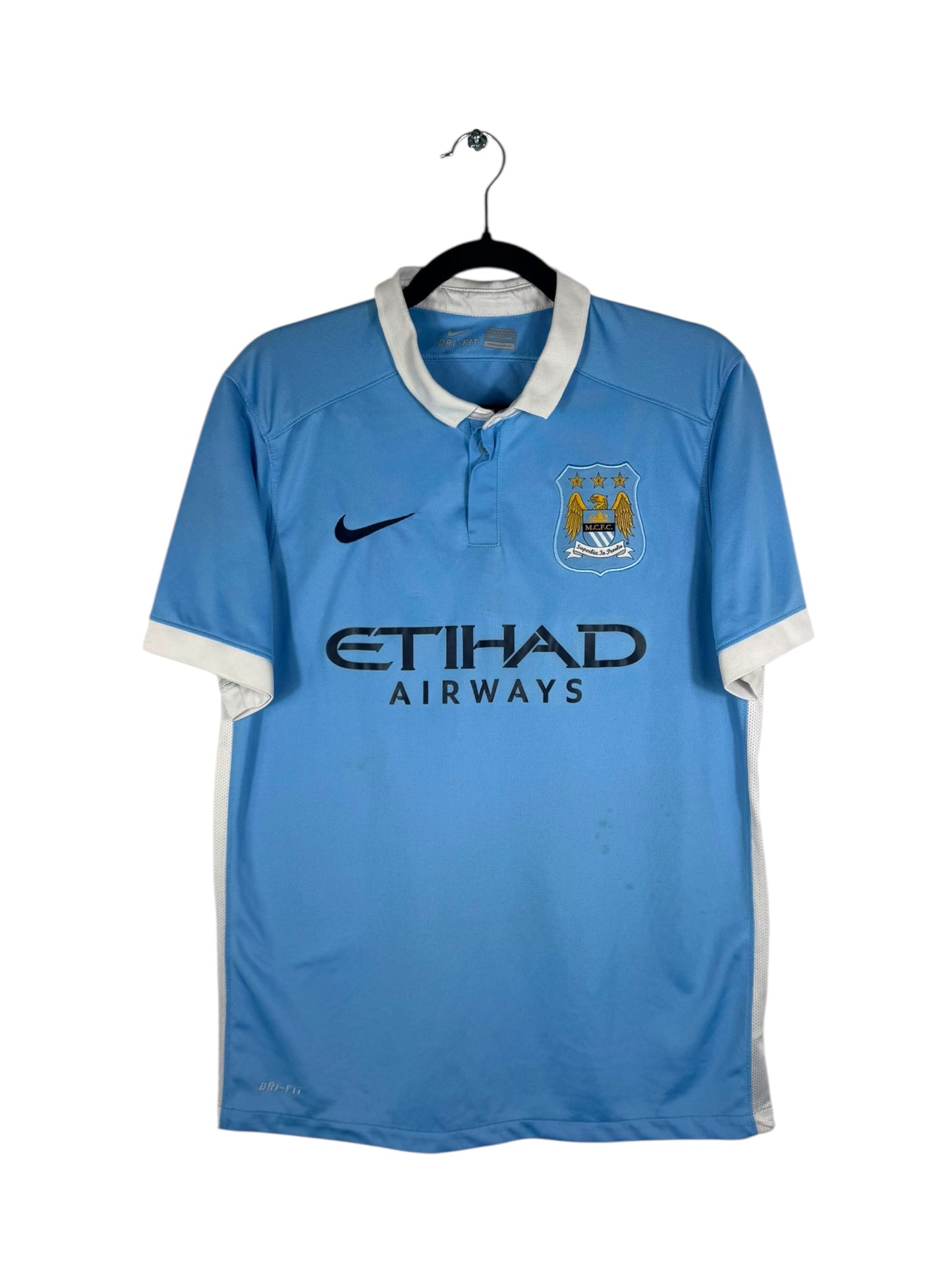 Maillot Manchester City 2015-2016 domicile Nike vue avant sponsor et écusson
