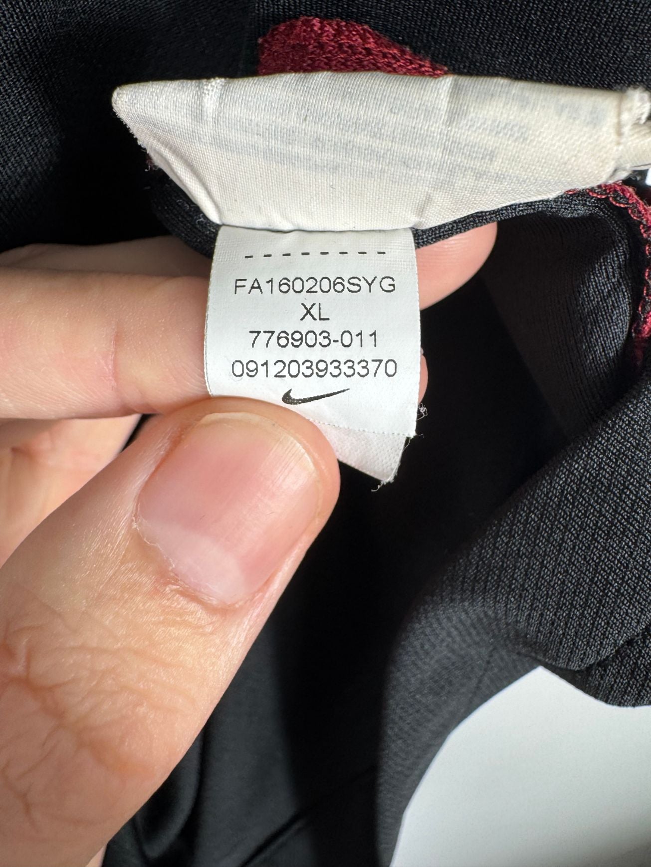 Étiquette d'authenticité avec code Nike 776903-011 prouvant l'originalité du maillot