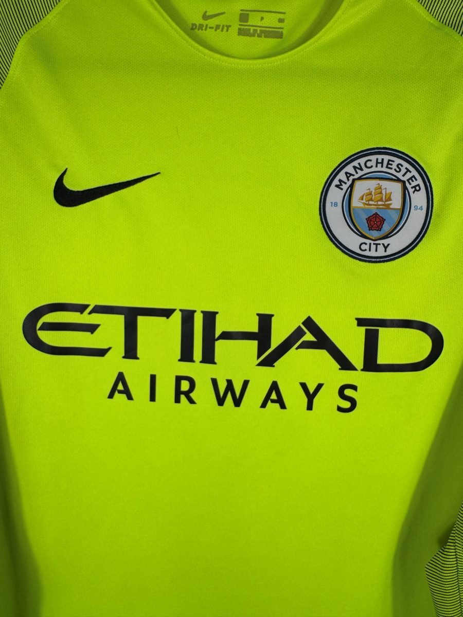 Écusson Manchester City, swoosh Nike et sponsor Etihad, maillot gardien 2016-2017 Bravo