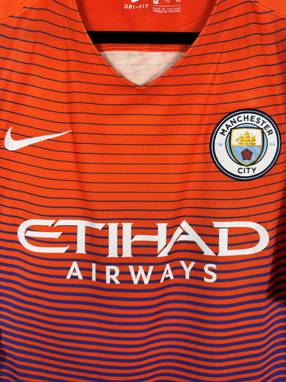 Écusson Manchester City brodé, virgule Nike et sponsor Etihad, maillot third 2016-2017