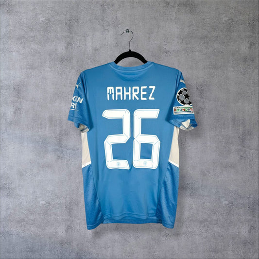 Maillot Manchester City 2021-2022 domicile bleu ciel, dos floqué Mahrez 26 et badge Ligue des champions