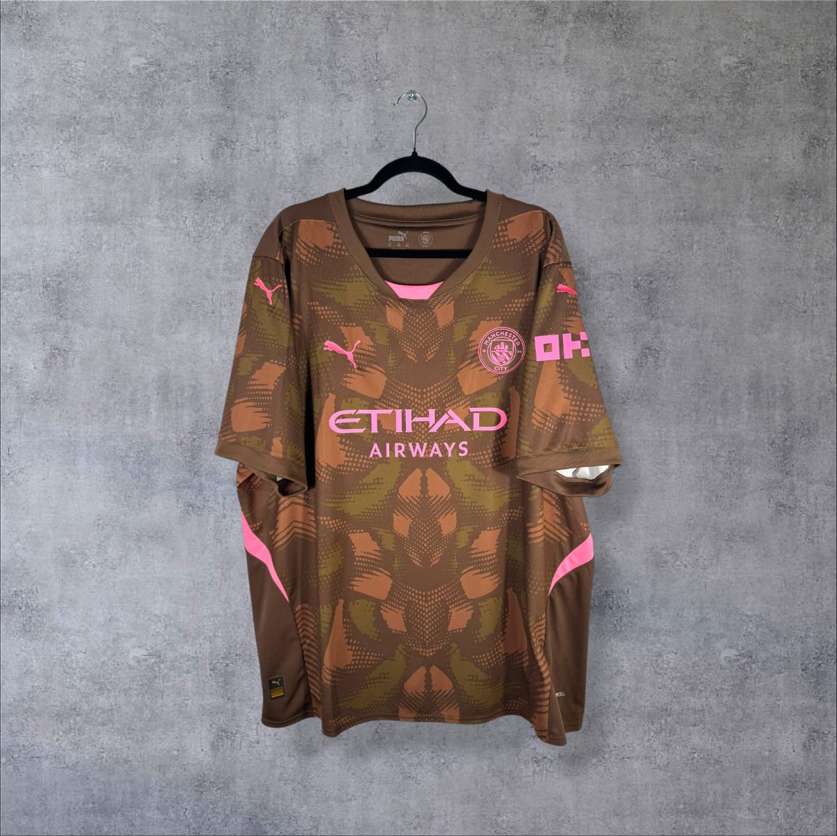 Face du maillot de gardien Manchester City 2024-2025 avec sponsor Etihad Airways