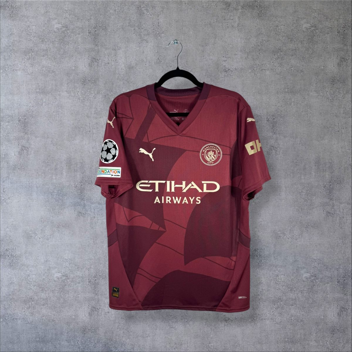 Maillot Manchester City third 2024-2025 Puma de face, sponsor Etihad Airways
