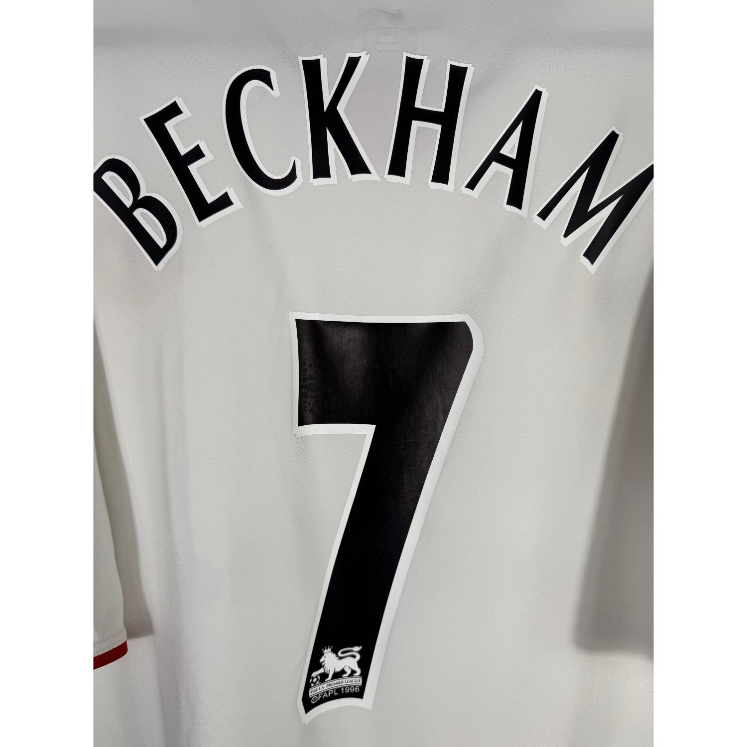 Détail de la typographie du flocage sur le numéro 7 de David Beckham